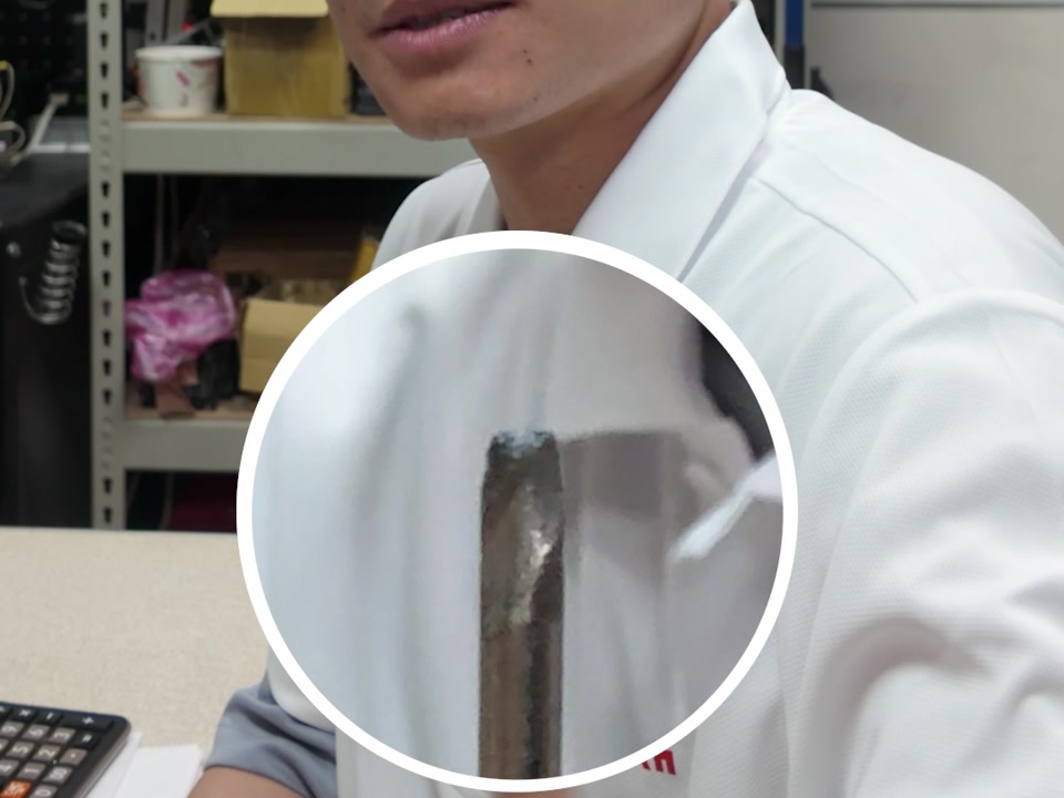 放大特寫一支已磨損斷裂的鑽頭柄部金屬斷面